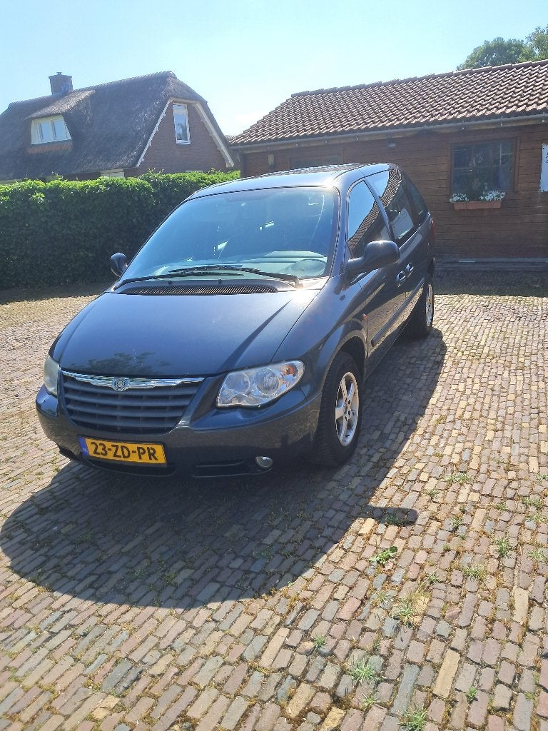 Chrysler Voyager 3.3 I AUT 2008 Blauw, Auto's, Chrysler, 3301 cc, Blauw, 7 stoelen, 120 €/maand