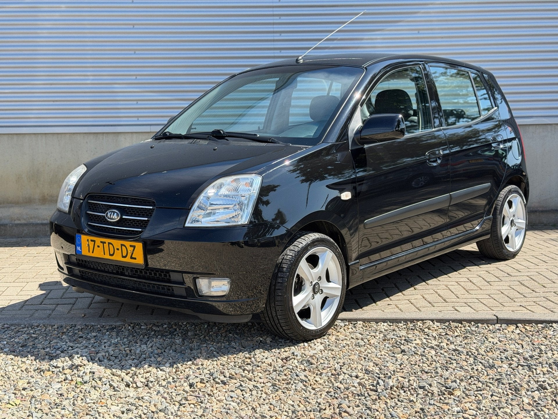 Kia Picanto 1.0 M-bition [ aircoaudio,lmv,spoilerset ], Voorwielaandrijving, Stof, Zwart, 400 kg