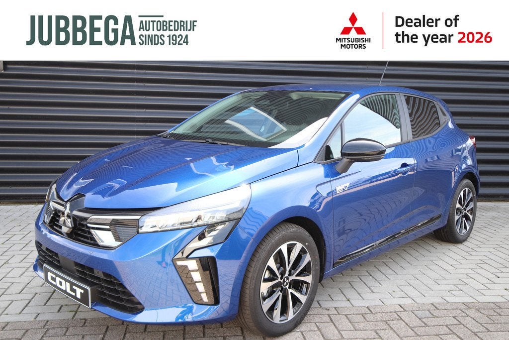 Mitsubishi Colt 1.6 HEV Intense €4.600 korting! Automaat N, Auto's, Mitsubishi, 12 maanden, Stof, 4 cilinders, Blauw
