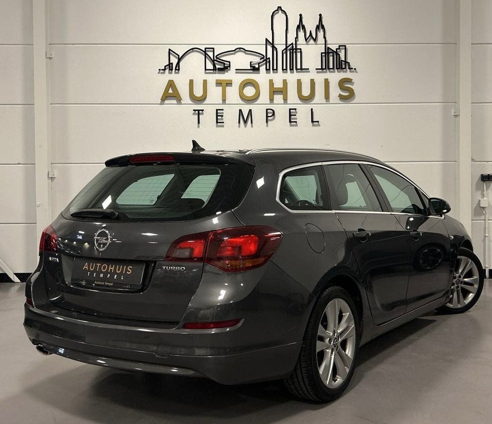 Opel Astra Sports Tourer 1.4 Turbo Sport Nap Airco Cruise Pa, Auto's, Opel, Voorwielaandrijving, Euro 5, Stof, Gebruikt