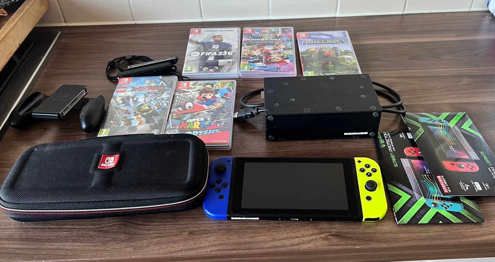 Nintendo Switch Lite met games ( minecraft mario fifa ), Ophalen of Verzenden, Nintendo, Gebruikt