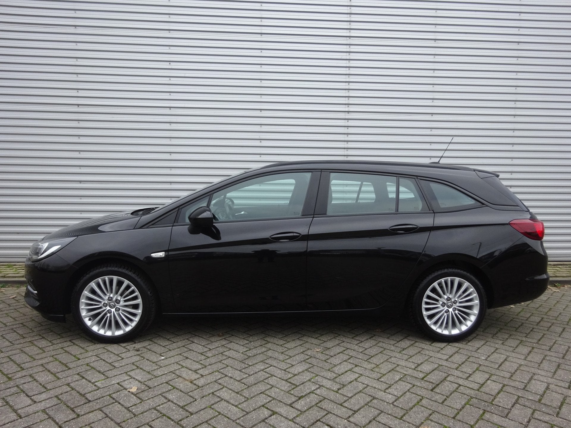 Opel Astra Sports Tourer 1.2 Business Edition 1e Eigenaar -, Auto's, Voorwielaandrijving, Stof, Euro 6, 1199 cc