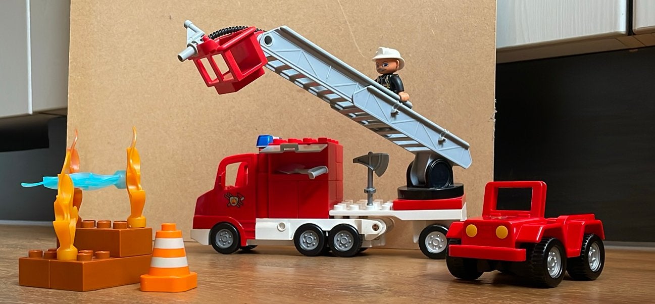 Duplo Brandweertruck en brandweerauto, Ophalen of Verzenden, Zo goed als nieuw, Complete set, Duplo
