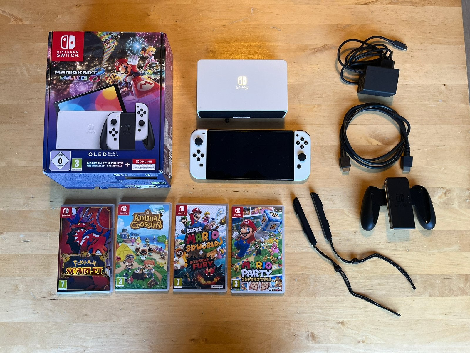Nintendo Switch Oled + 4 games, Spelcomputers en Games, Spelcomputers | Nintendo Switch, Zo goed als nieuw, Switch OLED, Met 1 controller