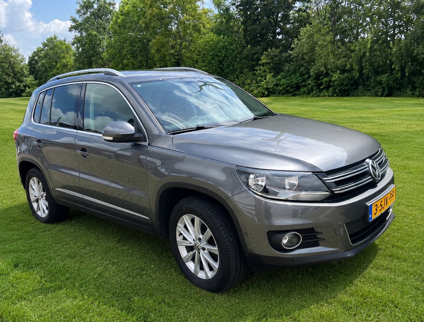 Volkswagen Tiguan 1.4 TSI 118KW BMT 2013 Grijs, Auto's, Voorwielaandrijving, 15 km/l, 1800 kg, 4 cilinders