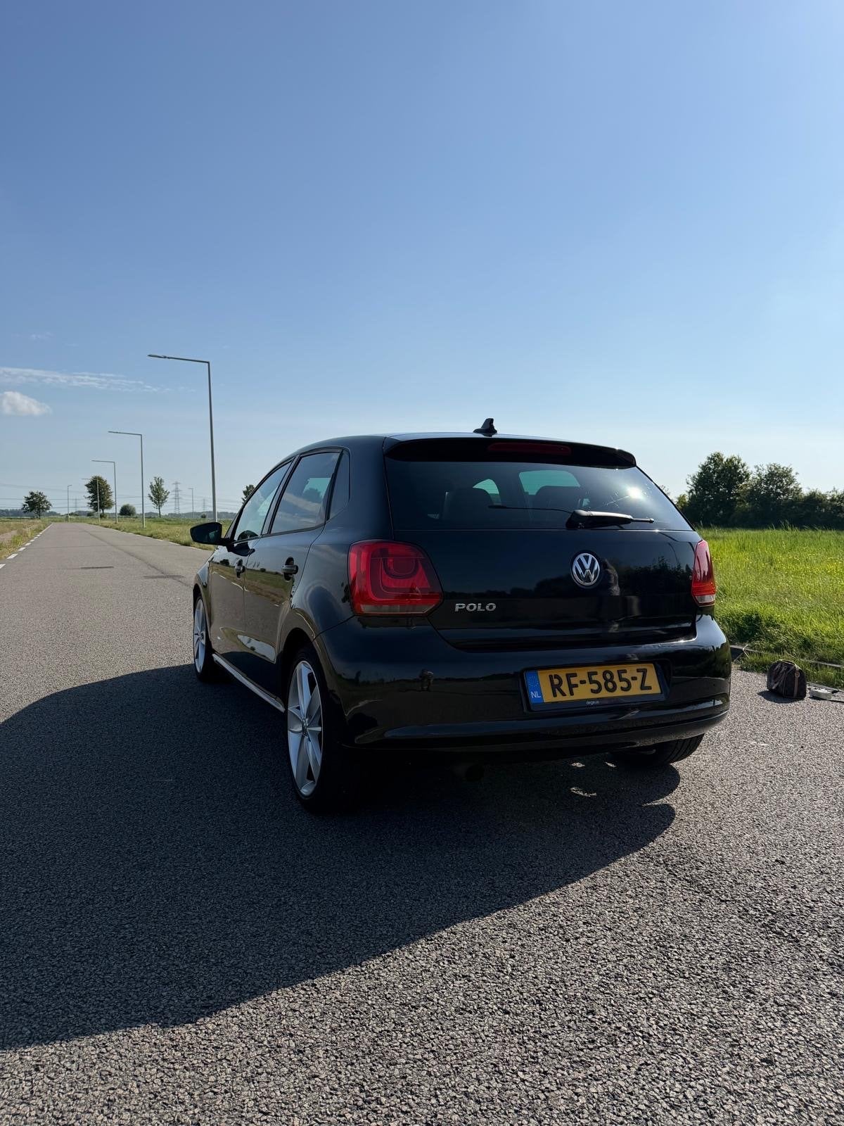 Volkswagen Polo 1.2 TSI 77KW 2010 Zwart, Auto's, Voorwielaandrijving, 40 €/maand, Zwart, 988 kg
