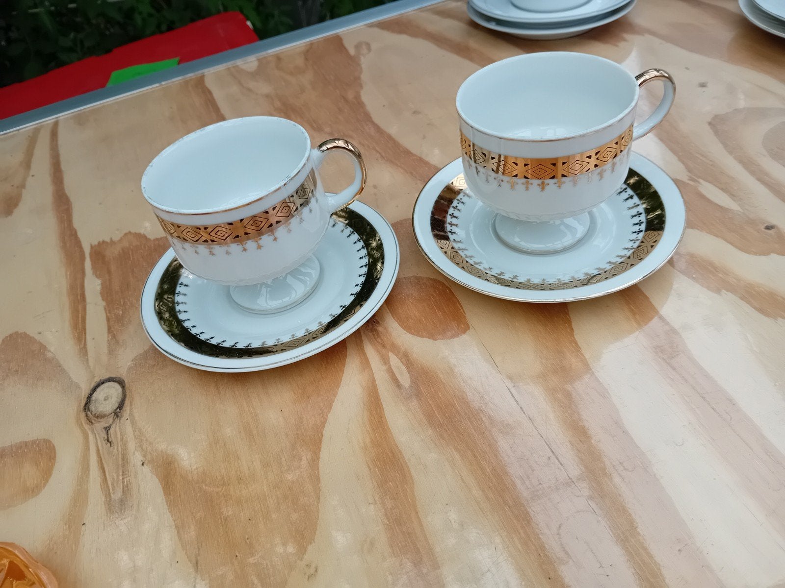 2 mooie kop en schotels met gouden decoratie, Ophalen