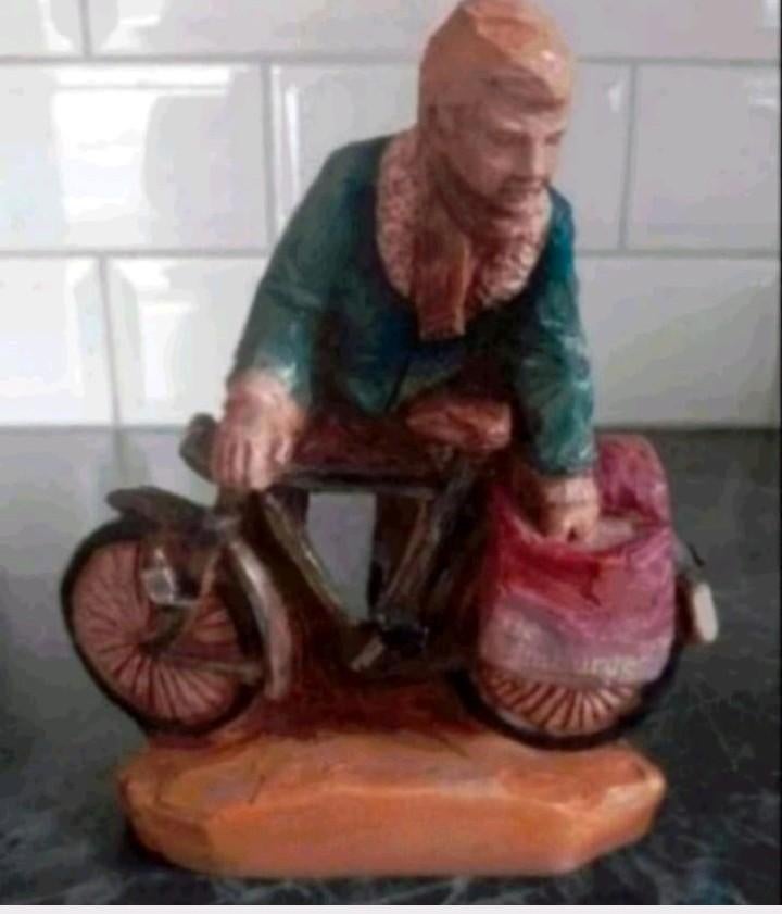 Beeldtje bezorger de Limburger, Ophalen