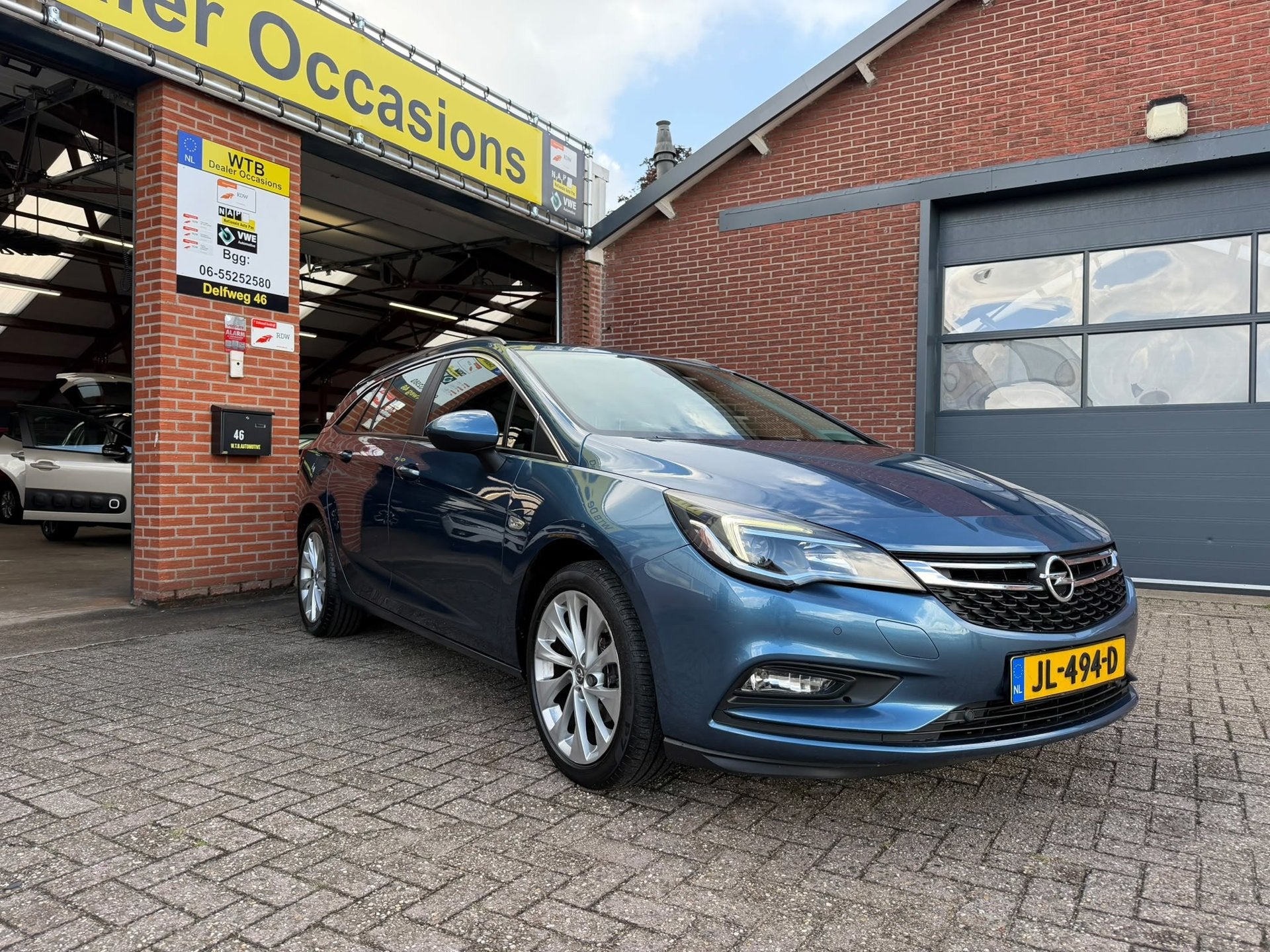 Opel Astra Sports Tourer 1.0 Edition, Navi, Airco Dealer oh,, Auto's, Opel, Voorwielaandrijving, Gebruikt, 1178 kg, Blauw