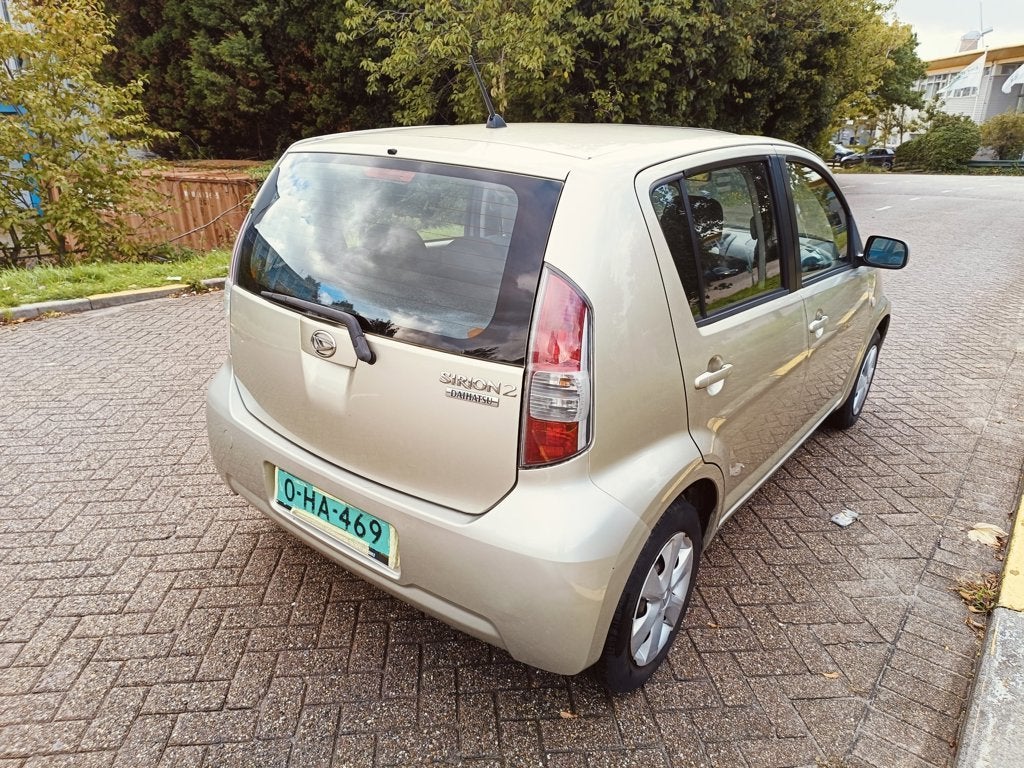 Daihatsu Sirion 2 1.3-16V Exclusive, Auto's, Gebruikt, 31 €/maand, 4 cilinders, Beige