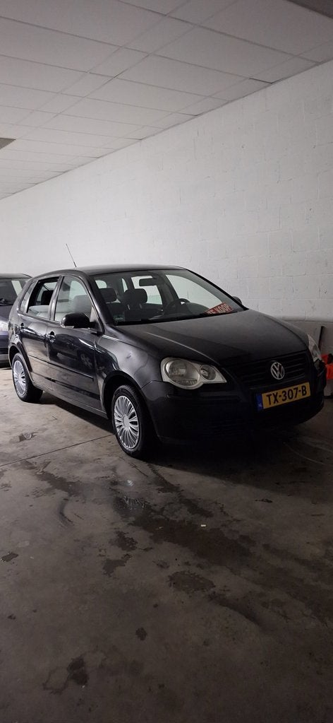 Volkswagen Polo 1.2-12V Turijn nieuwe apk, Auto's, Volkswagen, Voorwielaandrijving, Stof, Zwart, 540 kg