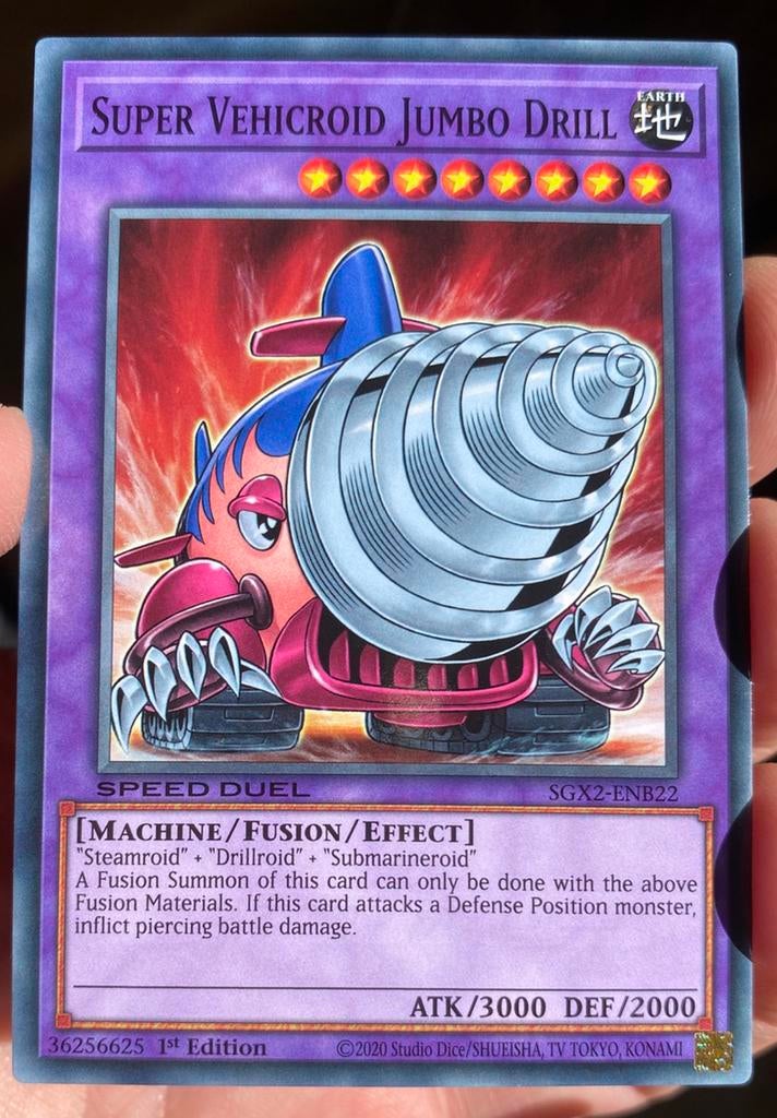 Yu-Gi-Oh! Super Vehicroid Jumbo Drill SGX2 1st Edition !, Ophalen of Verzenden, Zo goed als nieuw, Losse kaart