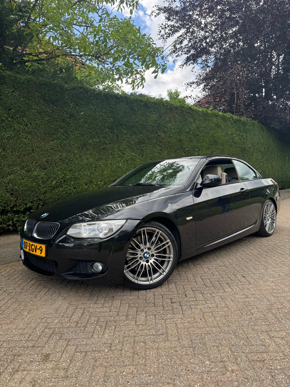 BMW 3-Serie 3.0 I 335 Cabrio DCT 2011 Zwart, Auto's, Automaat, Achterwielaandrijving, Cabriolet, 4 stoelen