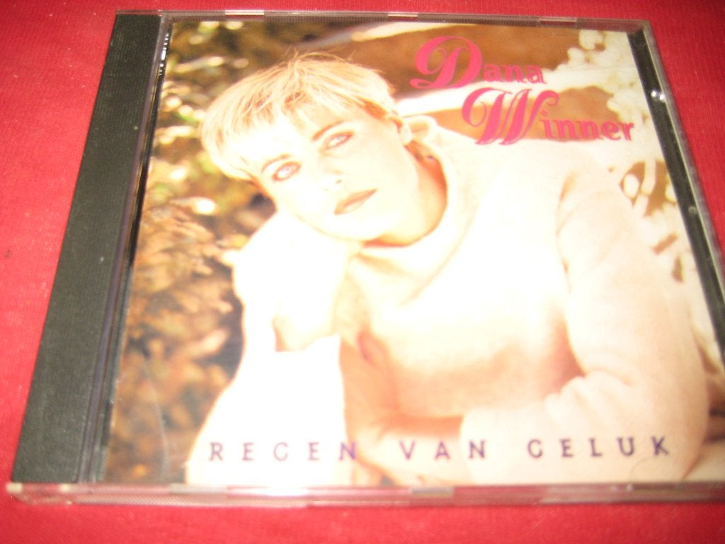 Dana Winner: Regen van geluk, Ophalen of Verzenden, Zo goed als nieuw
