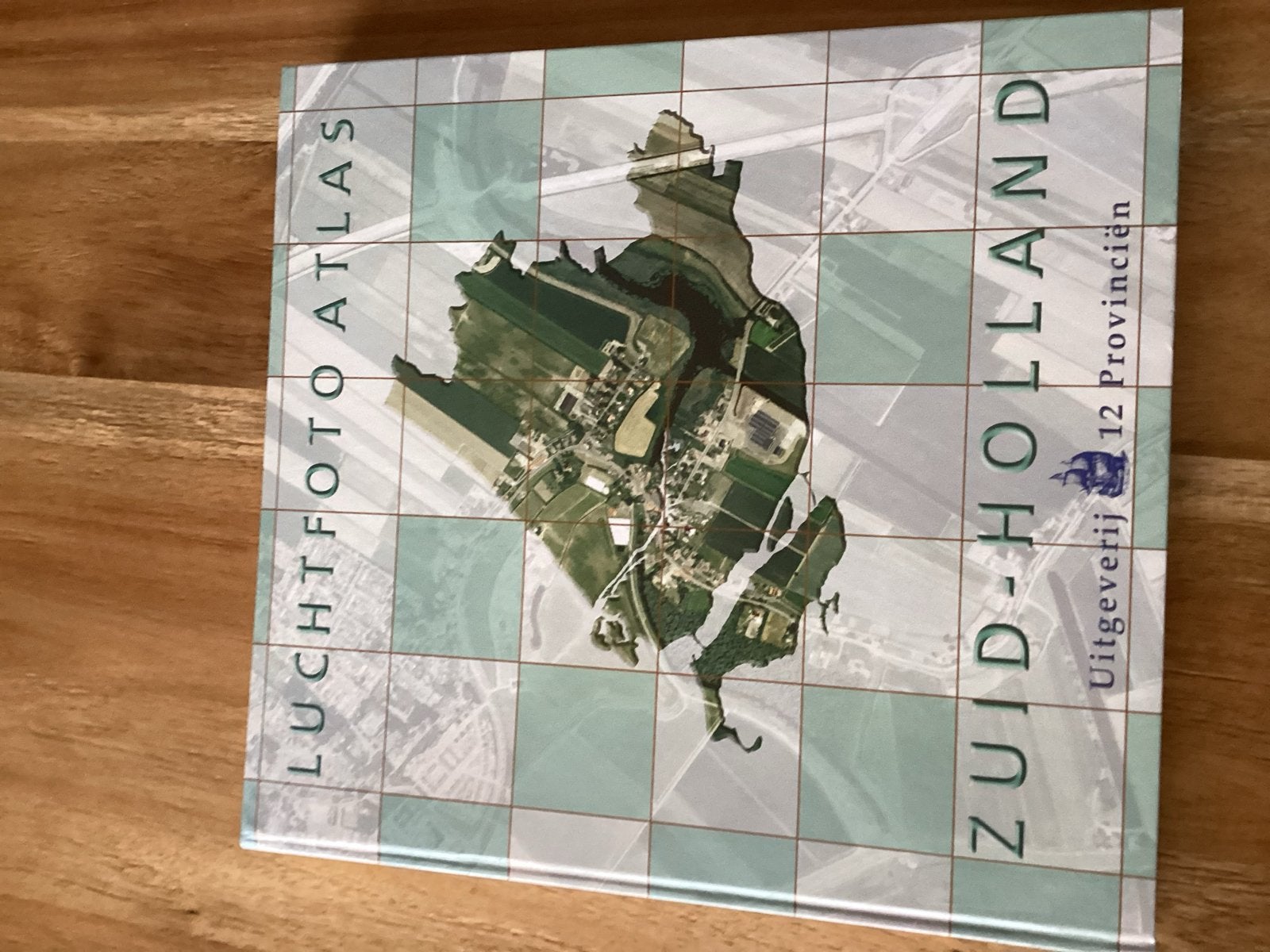 Luchtfoto Atlas Zuid-Holland - Uitgeverij 12 Provinciën, Boeken, Overige atlassen, 2000 tot heden, Ophalen of Verzenden, Zo goed als nieuw