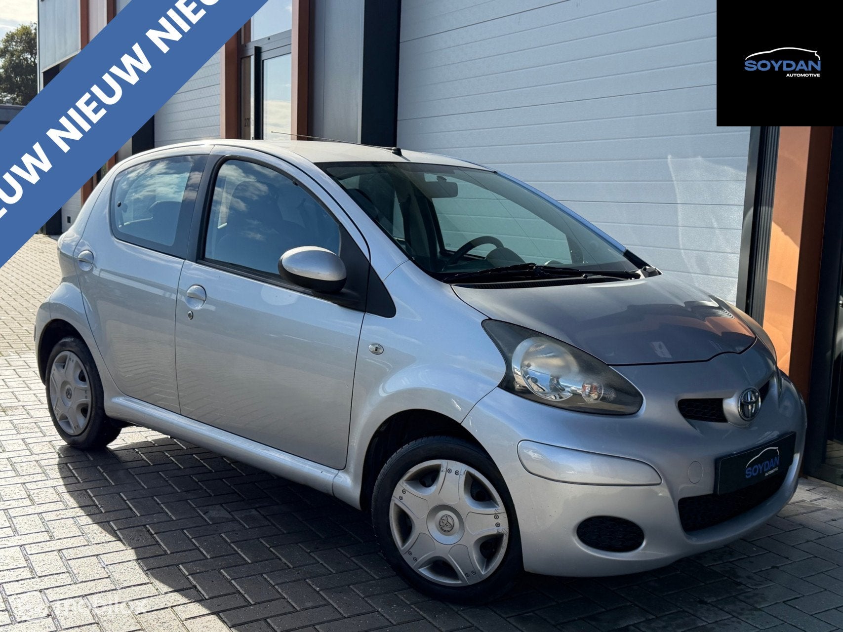 Toyota Aygo 1.0 VVT-i COMFORT NAVIGATO | AIRCO | NAP | DEALE, Auto's, Voorwielaandrijving, Euro 5, Gebruikt, 4 stoelen