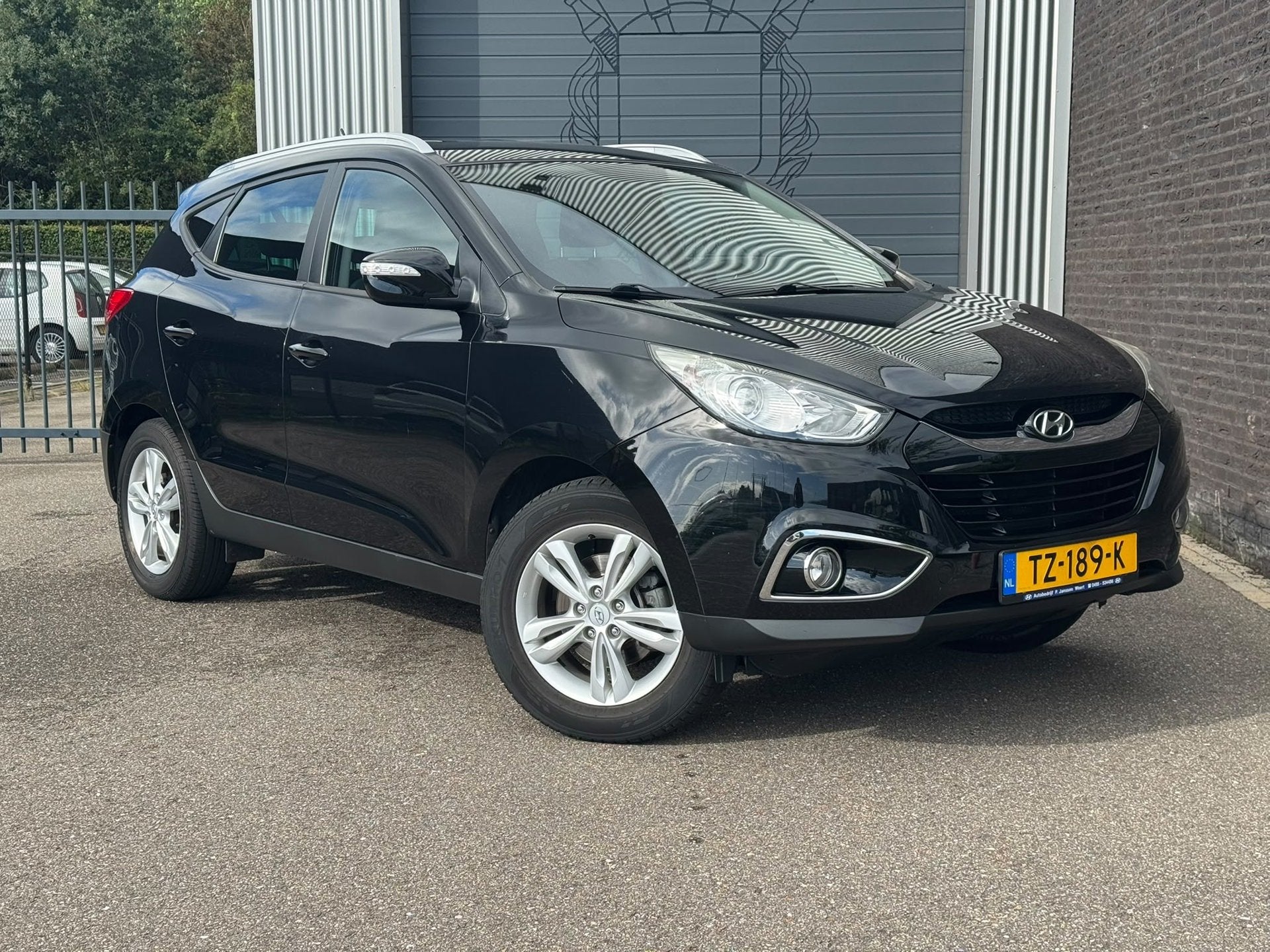 Hyundai Ix35 1.6i GDI Style Ecc, Auto's, Voorwielaandrijving, Euro 5, 4 cilinders, Leder en Stof