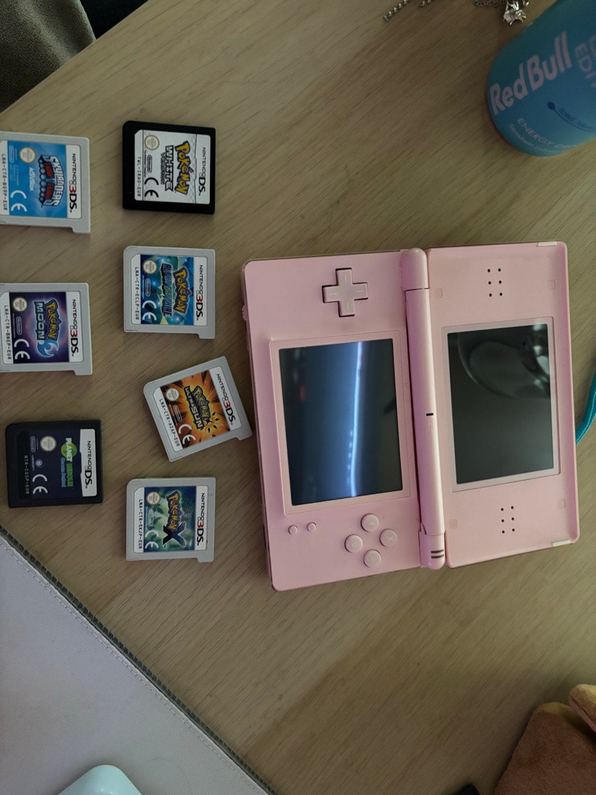 Roze DS Lite met 7 spellen: Pokémon, Skylanders, Planet Resc, Ophalen, Roze, DS Lite, Gebruikt