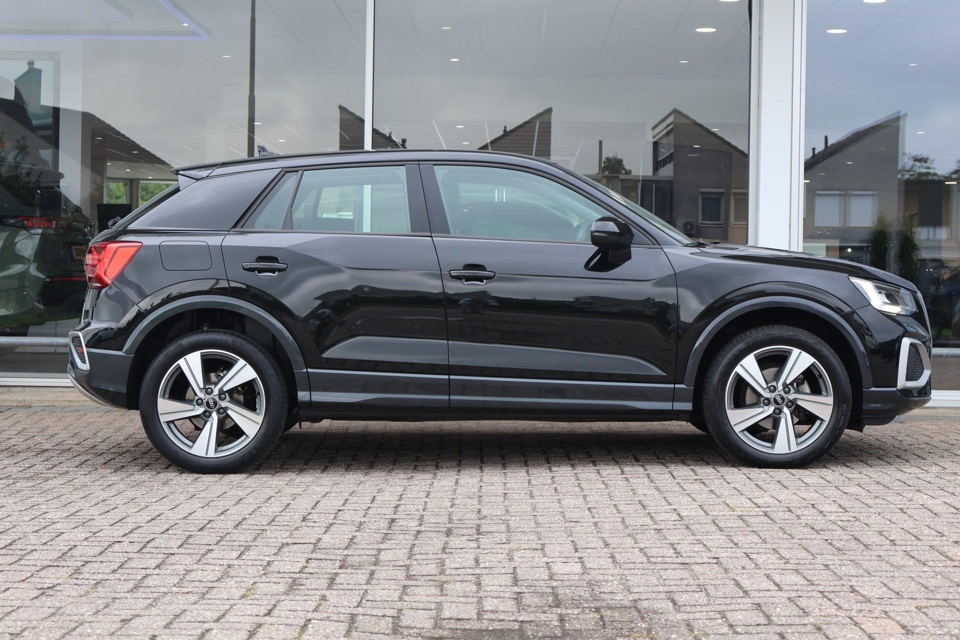Audi Q2 35 TFSI 150pk S-tronic Business Edition | Navigatie, 12 maanden, Stof, 4 cilinders, Zwart