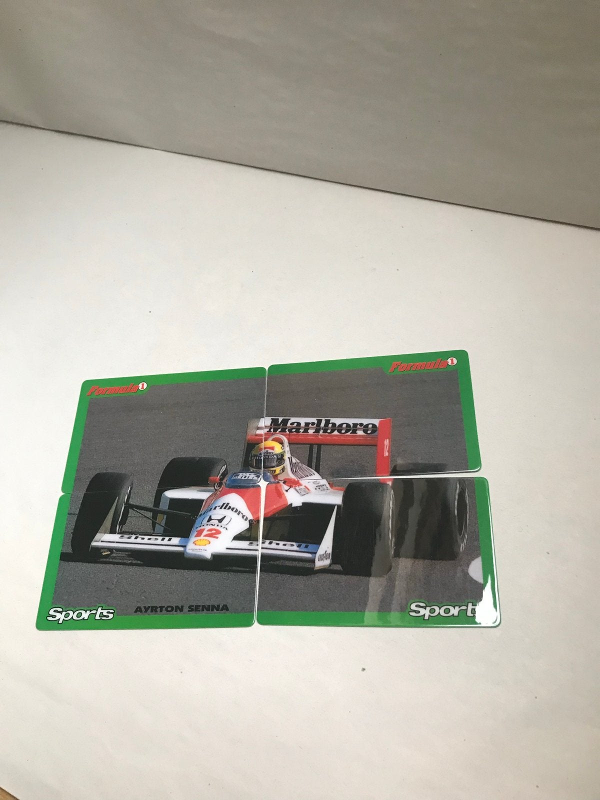 Ayrton Senna Formule Telefoon kaart in vier delen, Ophalen of Verzenden, Gebruikt, Overige sporten, Spelerskaart