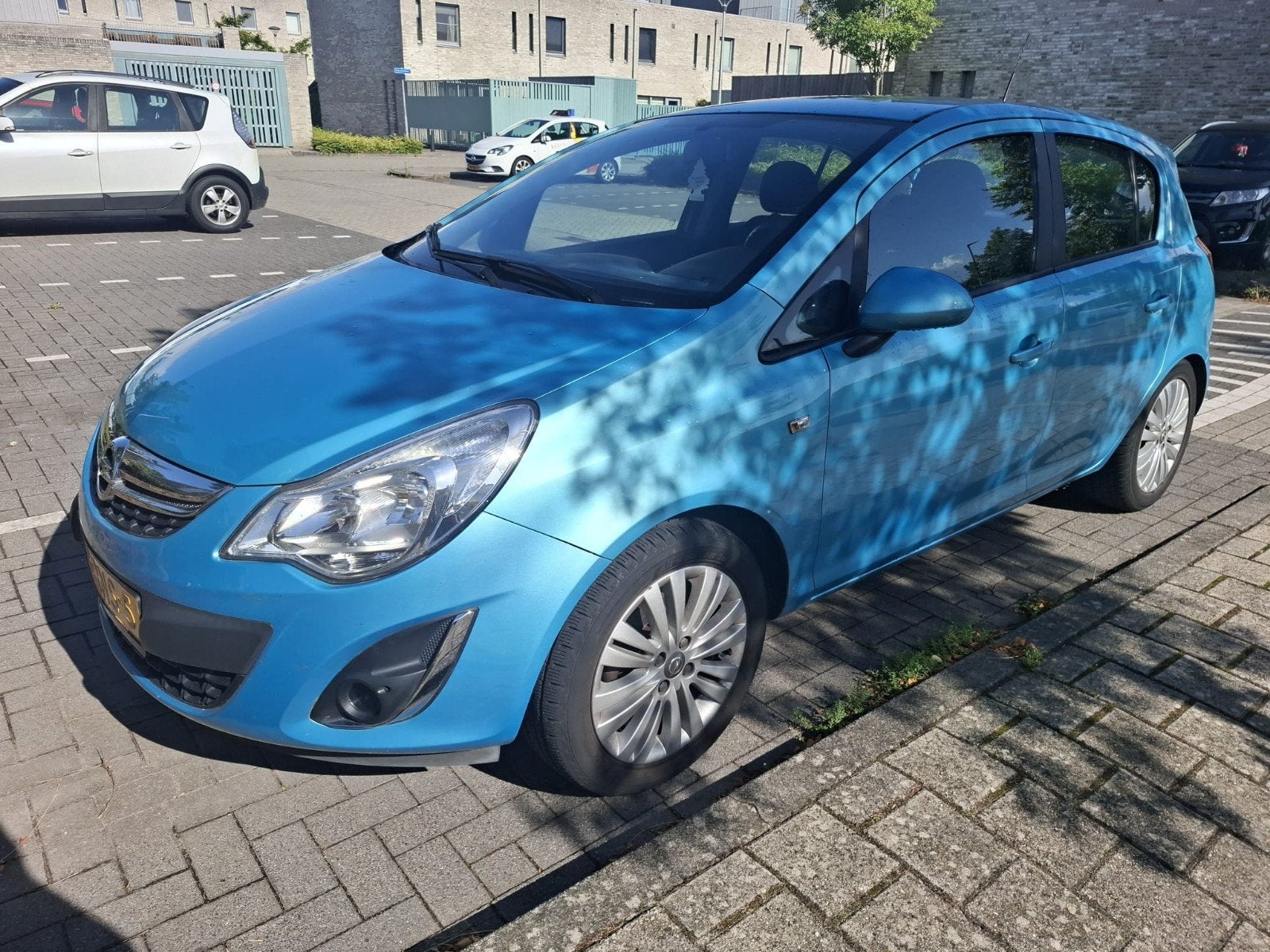 Opel Corsa 1.2 16V 5D 2011 Blauw, Auto's, Voorwielaandrijving, Euro 5, 4 cilinders, Multifunctioneel stuurwiel