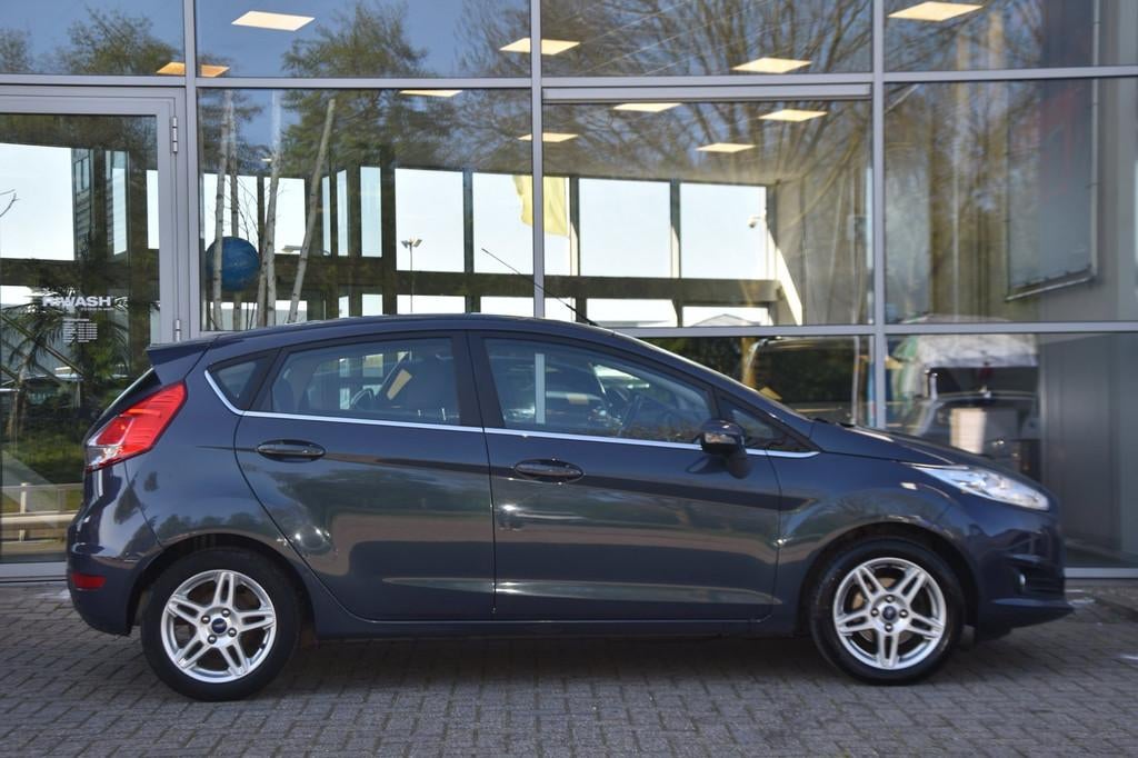 Ford Fiesta 1.0 EcoBoost Titanium Airco Nav. Pdc Lm-Velgen 1, Auto's, Ford, Voorwielaandrijving, Euro 5, Zwart, 23 km/l