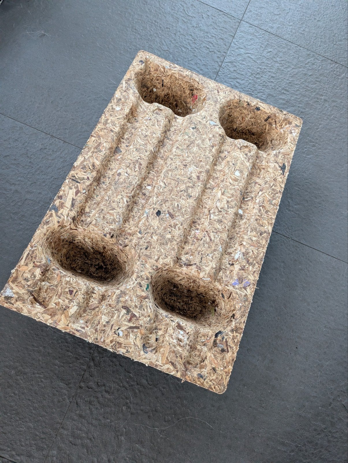 Mini-pallet van samengeperst hout, Ophalen