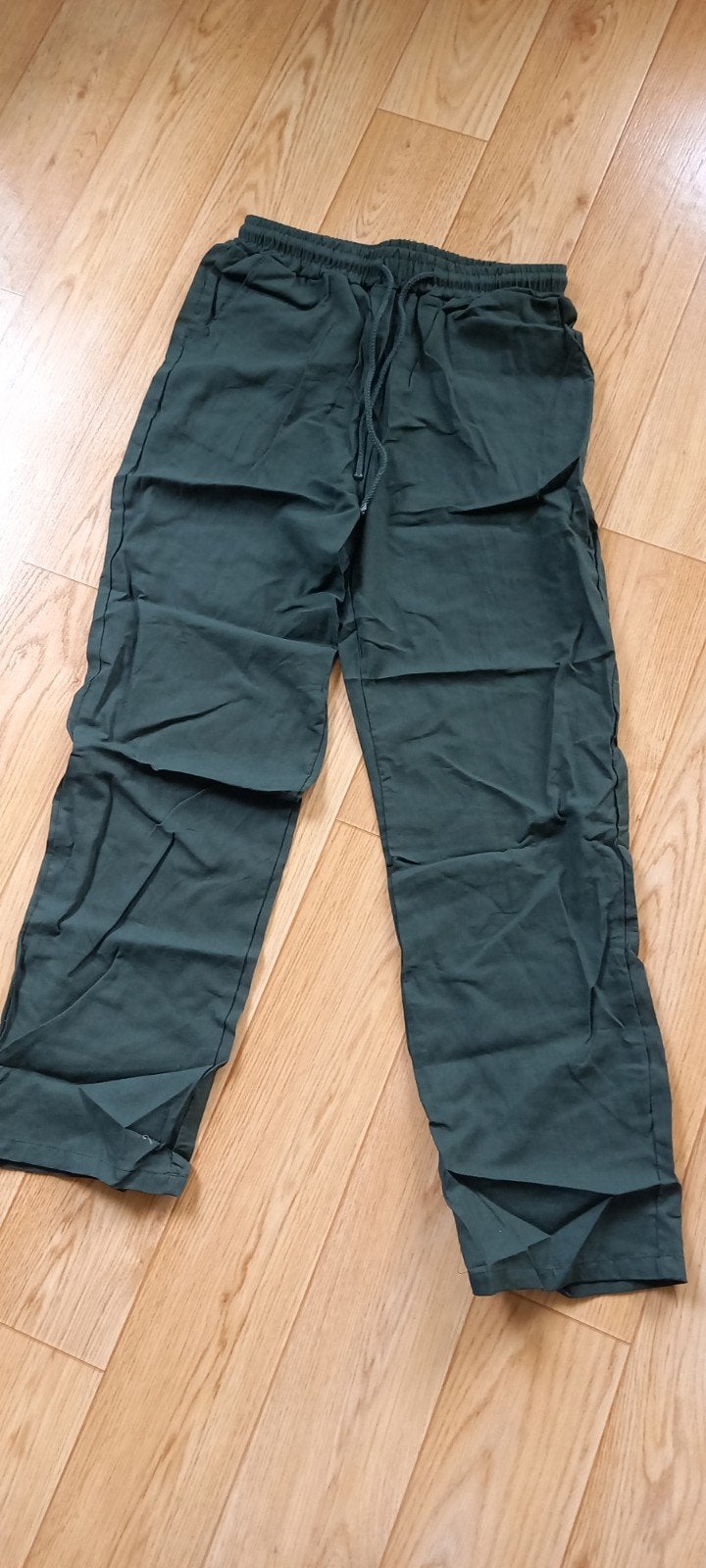 Donkergroene broek - 95% polyester, 5% elastaan, Maat 38/40 (M), Ophalen of Verzenden, Lang, Groen
