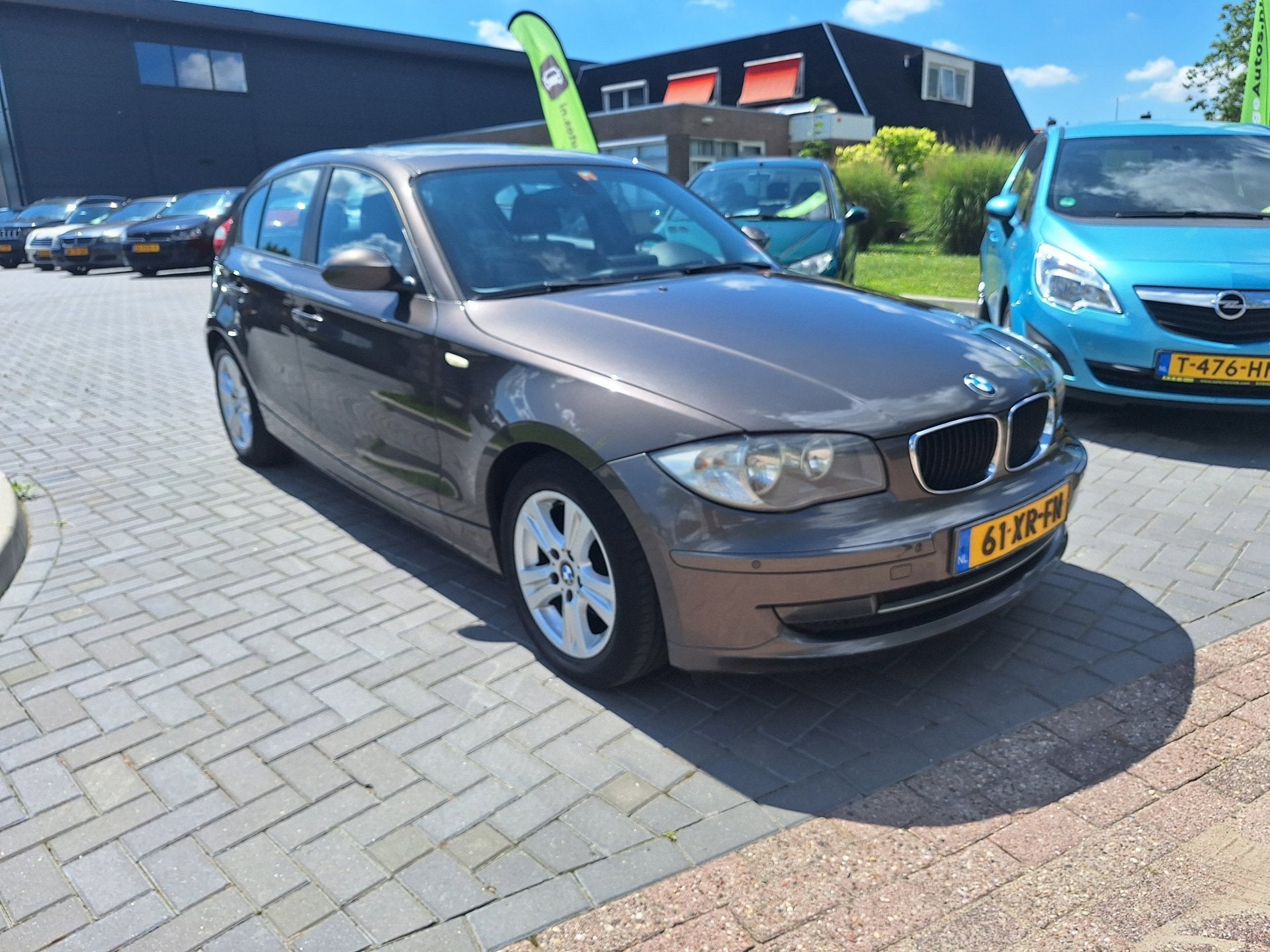 BMW 1-serie 120i Business Line / Zeer netjes / Automaat / AP, Auto's, BMW, Achterwielaandrijving, 1295 kg, 4 cilinders, Bruin