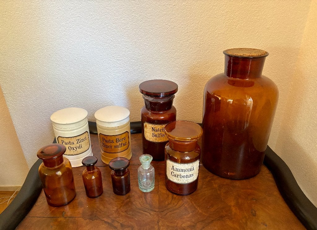 Set brocante apothekersflessen en zalfpotten, Ophalen