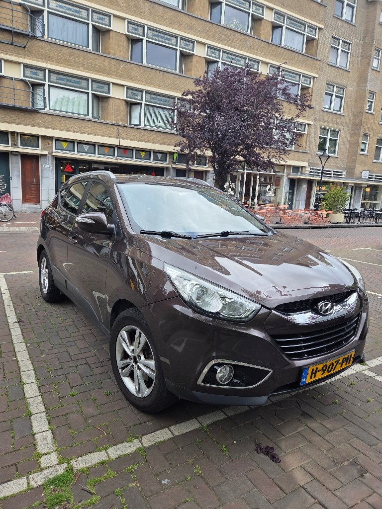 Hyundai iX35 1.6i GDI Blue 135pk 2012 Bruin, Auto's, Hyundai, Particulier, iX35, ABS, Airbags, Airconditioning, Android Auto, Bluetooth