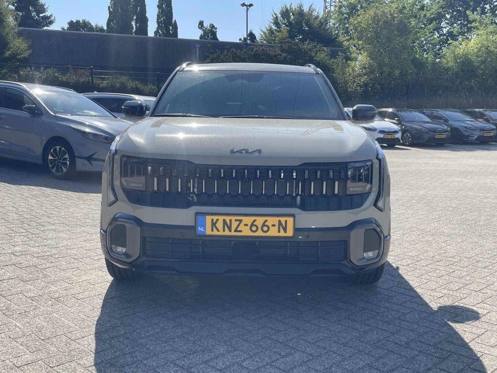 Kia Seltos 1.6 GDi Hyb. X-Line (bj 2026, semi-automaat), Auto's, Kia, Automaat, Gebruikt, 4 cilinders, Bruin