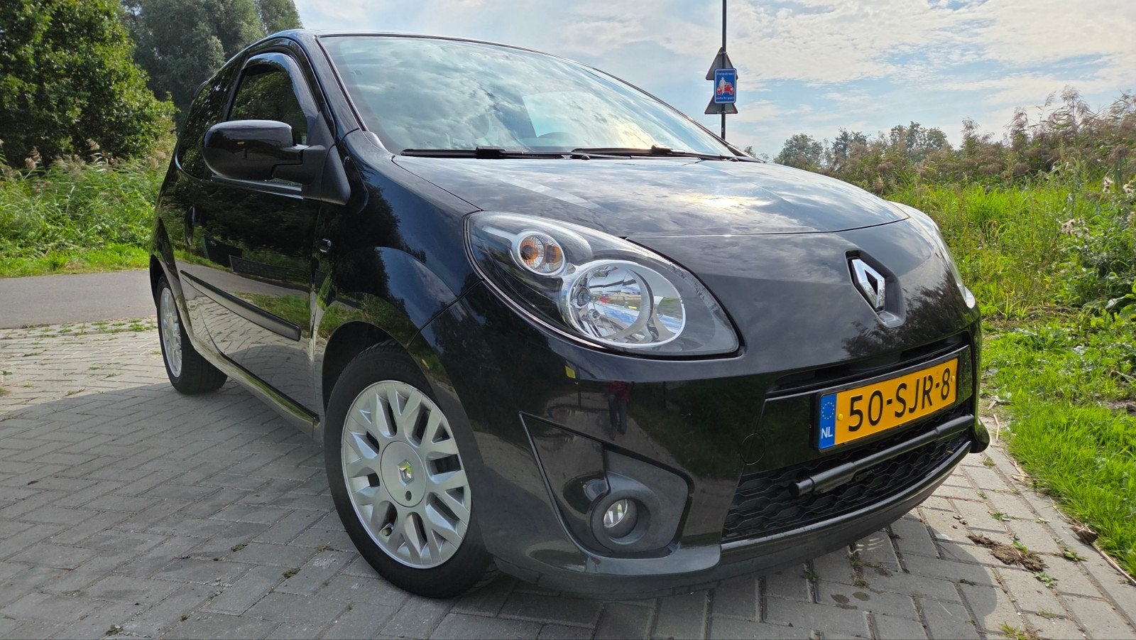 Renault Twingo 1.2 16V 2011 Zwart, Auto's, Twingo, Beige, 4 cilinders, 4 stoelen