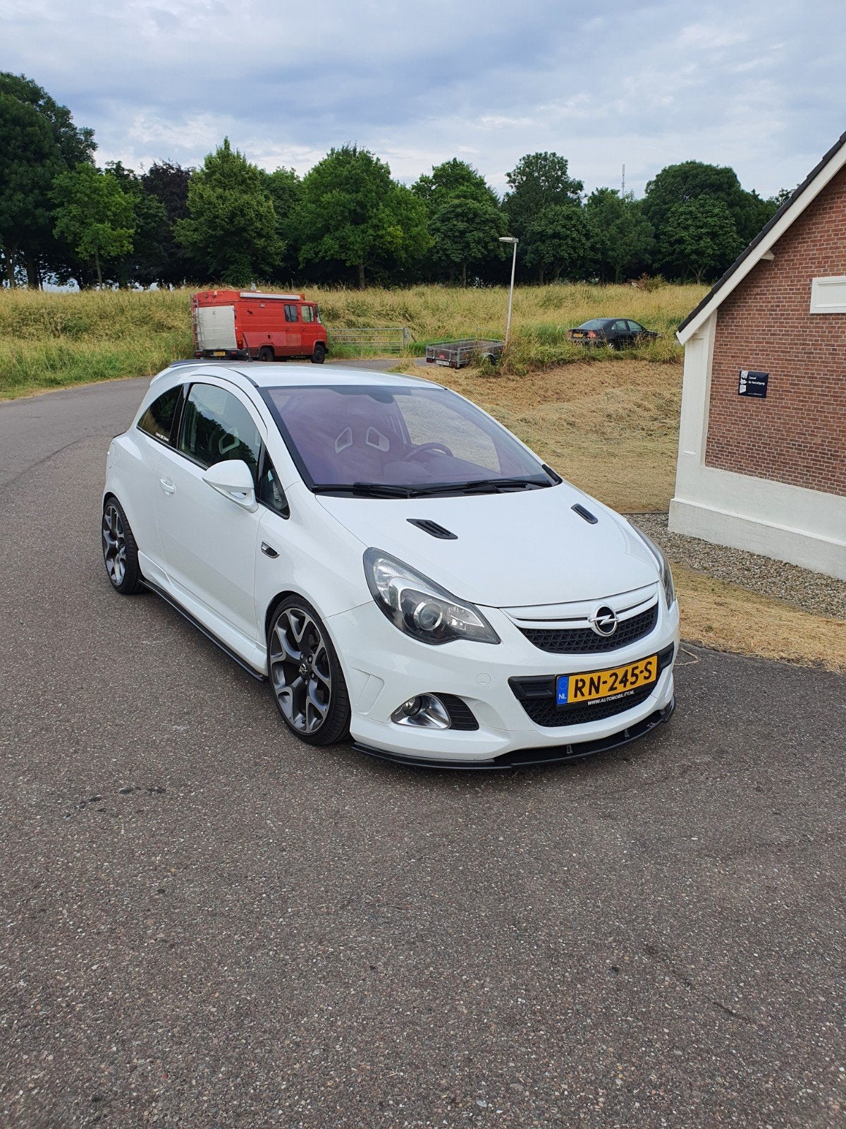 Opel Corsa 1.6 OPC 3D 2011 Wit, Auto's, Voorwielaandrijving, Electronic Stability Program (ESP), Zwart, Leder en Stof