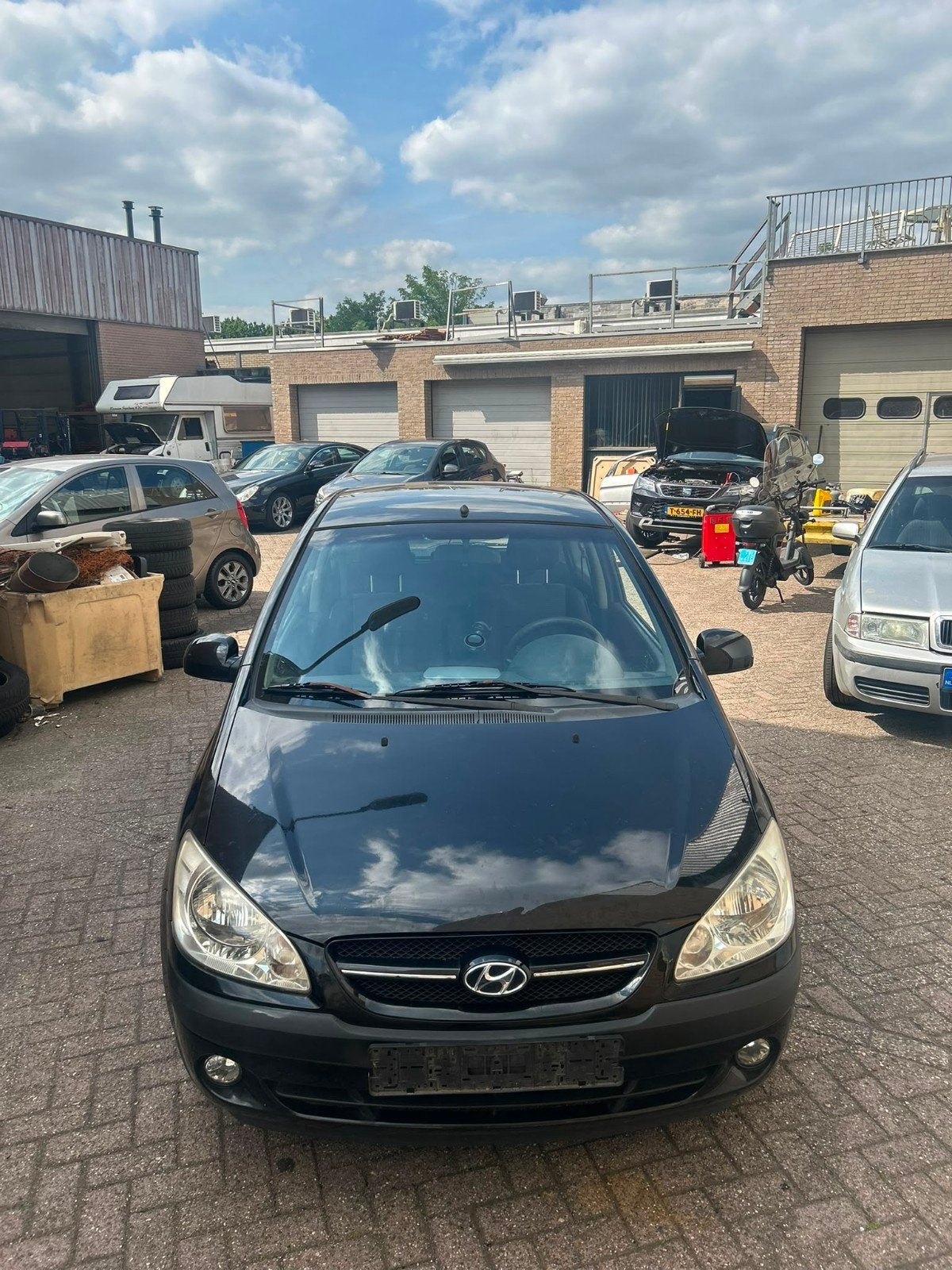 Hyundai Getz 1.4 3DRS AUT 2006, Nieuwe Distr + V riemen., Auto's, 40 €/maand, Zwart, 4 cilinders, Bedrijf