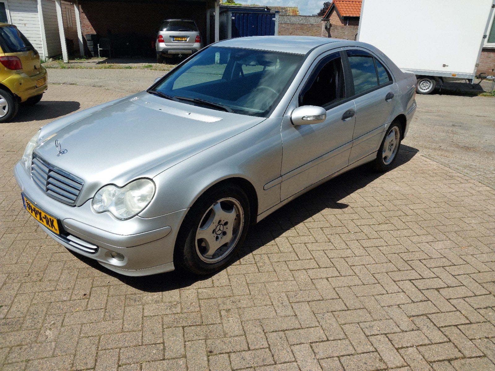 Mercedes-Benz C-Klasse 1.8 C180 Kompr Sedan 2005 Grijs, Auto's, Zwart, 1796 cc, Origineel Nederlands, Handgeschakeld
