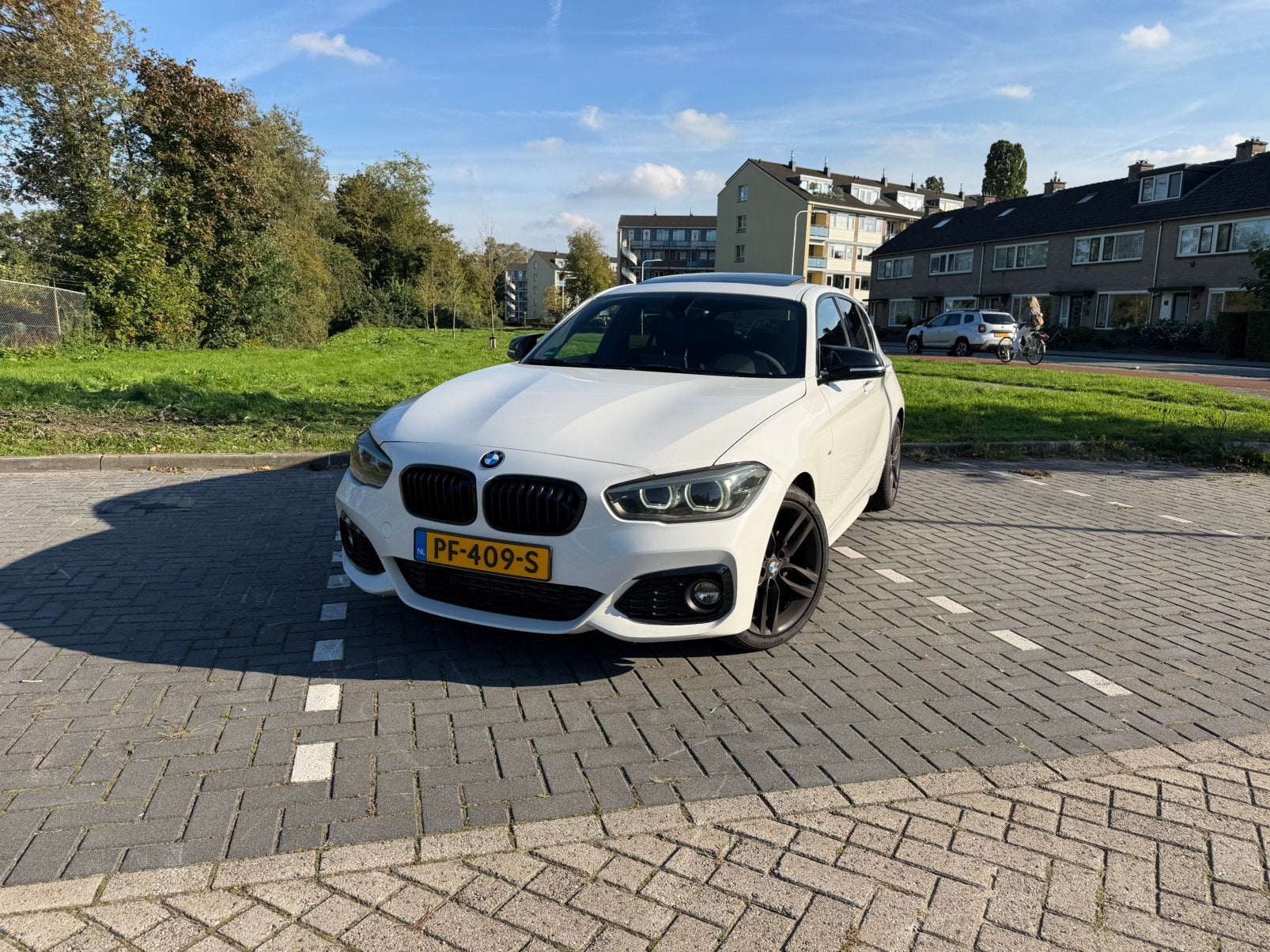 BMW 1-Serie 118i 180pk Aut 2017 Wit Pano, Auto's, Achterwielaandrijving, Wit, 19 km/l, Particulier