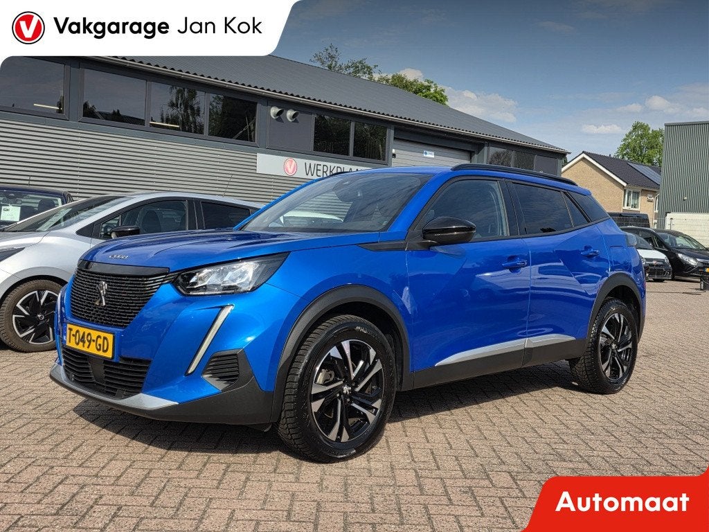 Peugeot 2008 1.2 PureTech Allure, navi, trekhaak, stoelverw., Auto's, Gebruikt, 1199 cc, Blauw, Leder en Stof