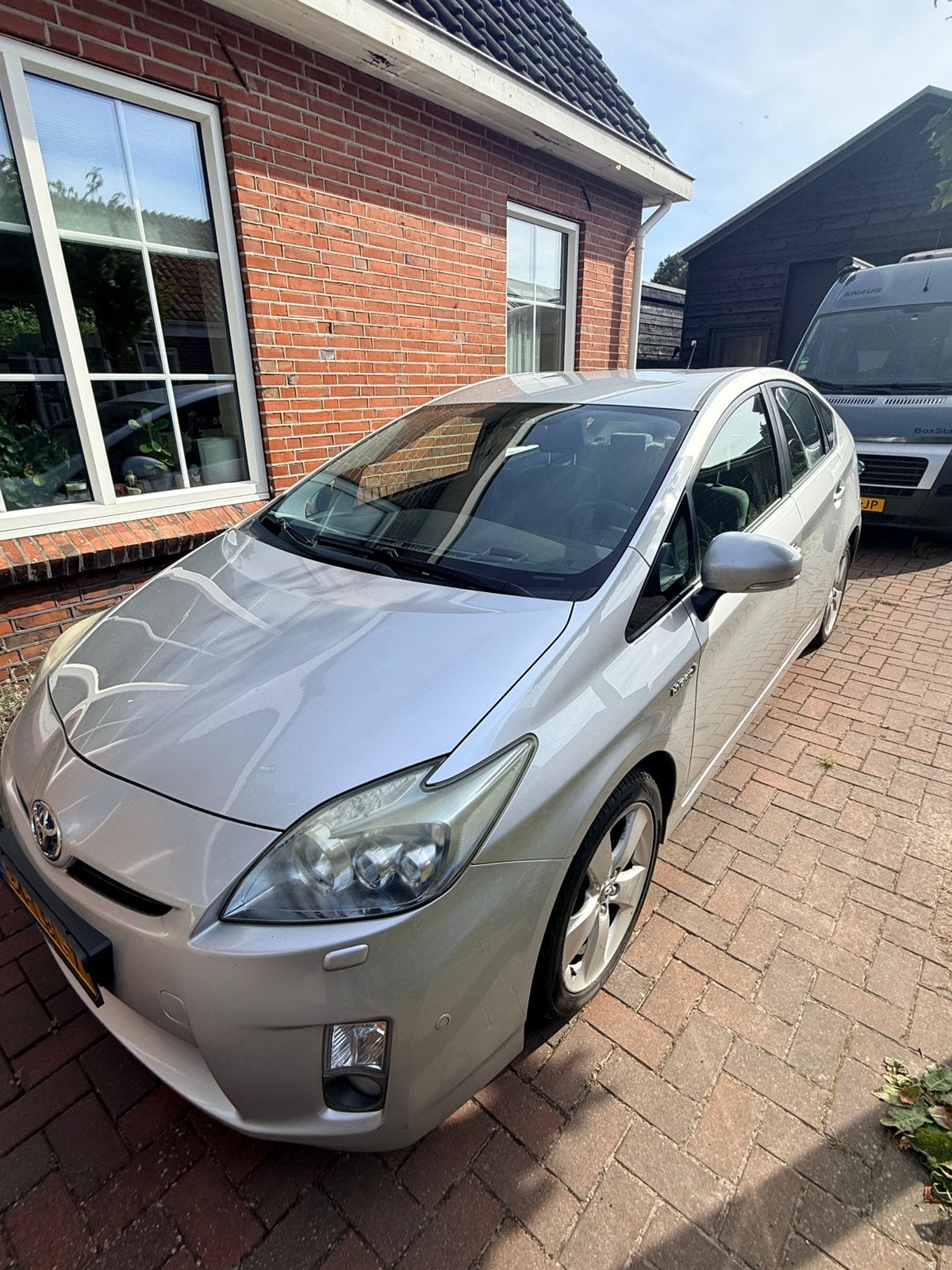 Toyota Prius 1.8 Full Hybrid 136PK Aut 2010 Grijs, Auto's, 4 cilinders, Origineel Nederlands, Prius, 25 km/l