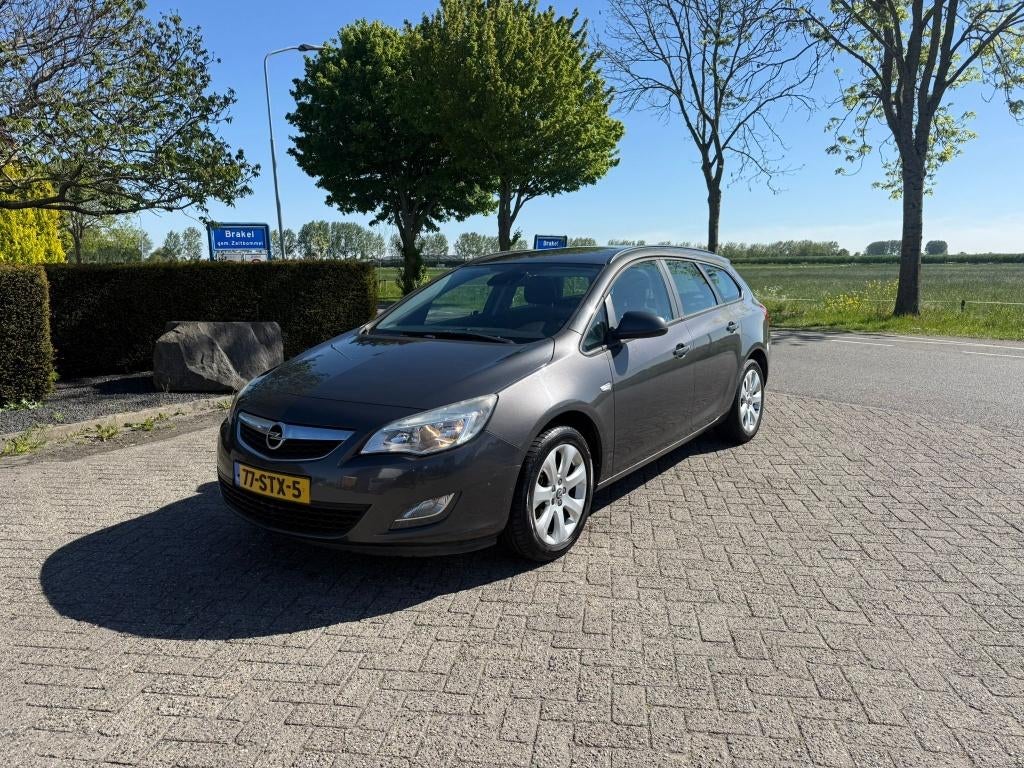 Opel Astra 1.4 74KW ST 2011 Grijs, Auto's, Voorwielaandrijving, Euro 5, Stof, 4 cilinders