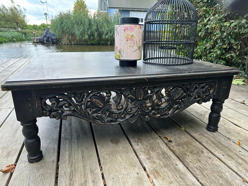 Balinese salontafel zwart teakhout onderkant bewerkt, Ophalen of Verzenden, Zo goed als nieuw, Rechthoekig
