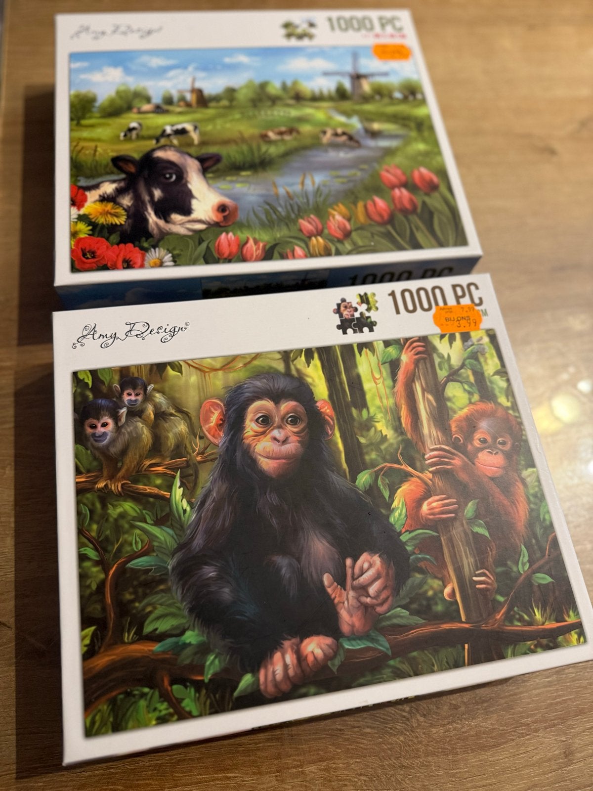 2x Amy Design Legpuzzel 1000 stukjes - Koe & Apen, Hobby en Vrije tijd, Ophalen, 500 t/m 1500 stukjes, Zo goed als nieuw, Legpuzzel