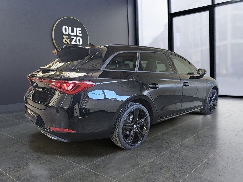 Seat Leon Sportstourer 1.5 TSI e-Hybrid FR Business | All-in, Auto's, Seat, 4 cilinders, Leder en Stof, Zwart, 1700 kg