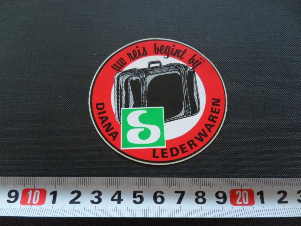 sticker Uw reis begint bij DIANA Lederwaren, Ophalen, Zo goed als nieuw
