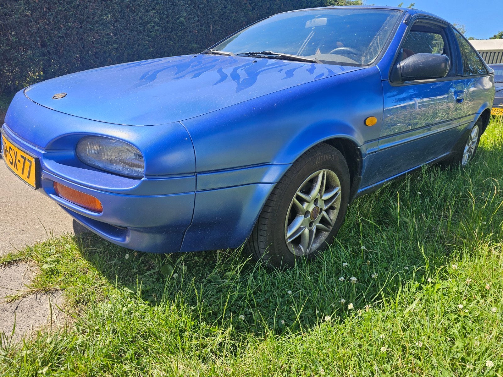 Nissan 100 NX 1.6 E E2 1994 Blauw, Auto's, Voorwielaandrijving, 40 €/maand, 4 cilinders, Blauw