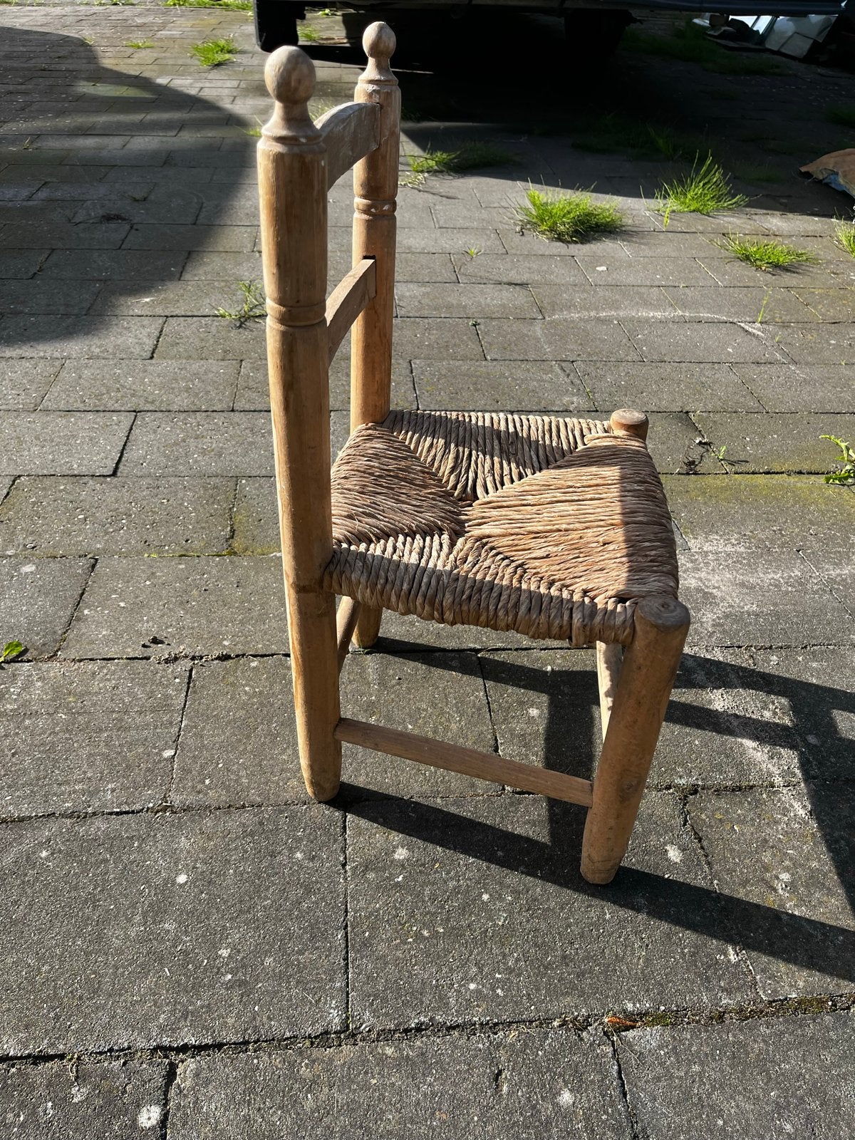 Vintage houten kinderstoel met rieten zitting, Ophalen