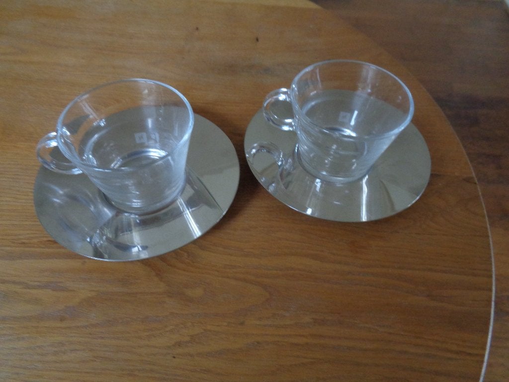 2 Nespresso koffie kop en schotel., Overige merken, Ophalen of Verzenden, Modern, Kop(pen) en/of Schotel(s)