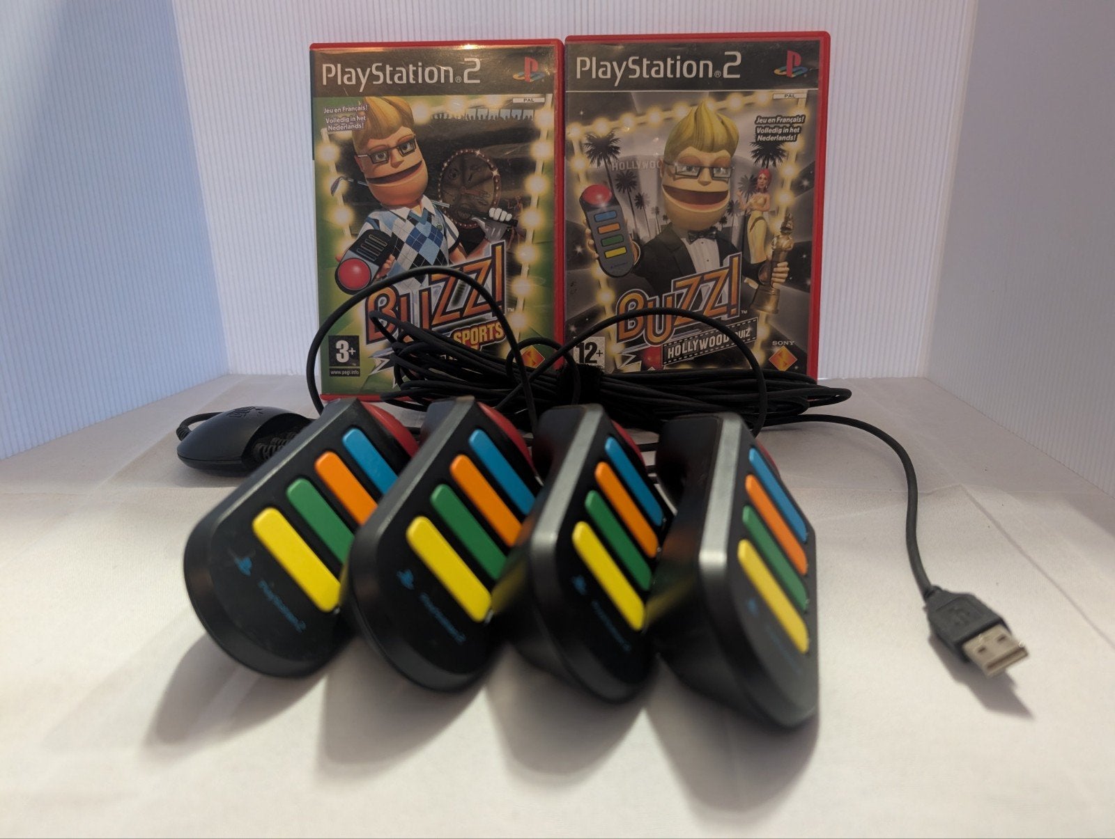 Buzz! Quiz Games PlayStation 2 met 4 controllers, Gebruikt, Overige genres, Eén computer, Ophalen of Verzenden