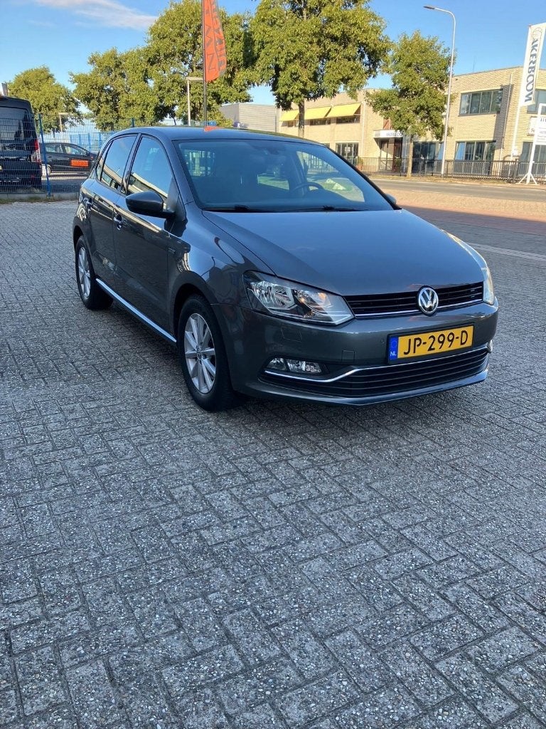 Volkswagen Polo 1.0 TSI 81KW DSG 2015 Grijs, Auto's, Stof, 40 €/maand, Euro 6, 23 km/l