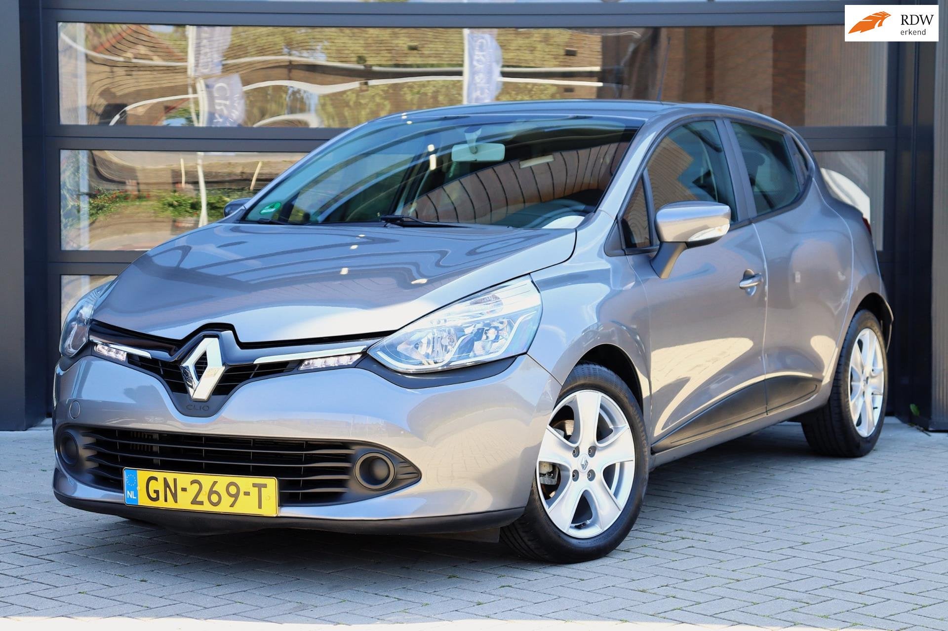 Renault Clio 1.2 Dynamique 120 PK Automaat | Trekhaak | Navi, Auto's, Euro 5, Stof, Gebruikt, Zwart